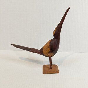 Vintage hard carved wood bird long beak treated